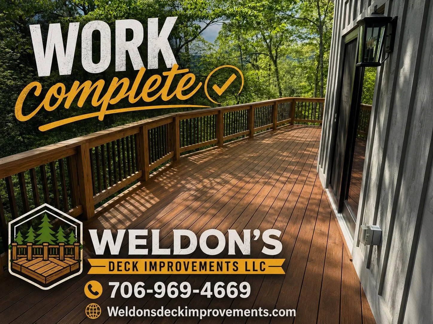 Composite deck with metal railing and vertical balusters overlooking wooded area